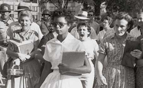 A photograph taken by Will Counts of Elizabeth Eckford attempting to enter Little Rock School on 4th September, 1957. The girl shouting is Hazel Massery.