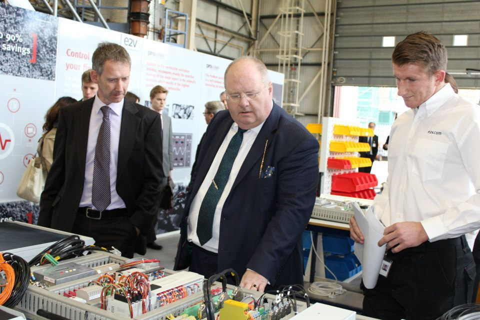 Former local government minister Eric Pickles (centre). Image from DCLG's Flickr account.