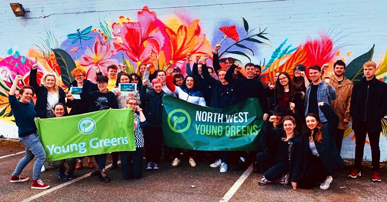 A photo of a group of Young Greens with banners