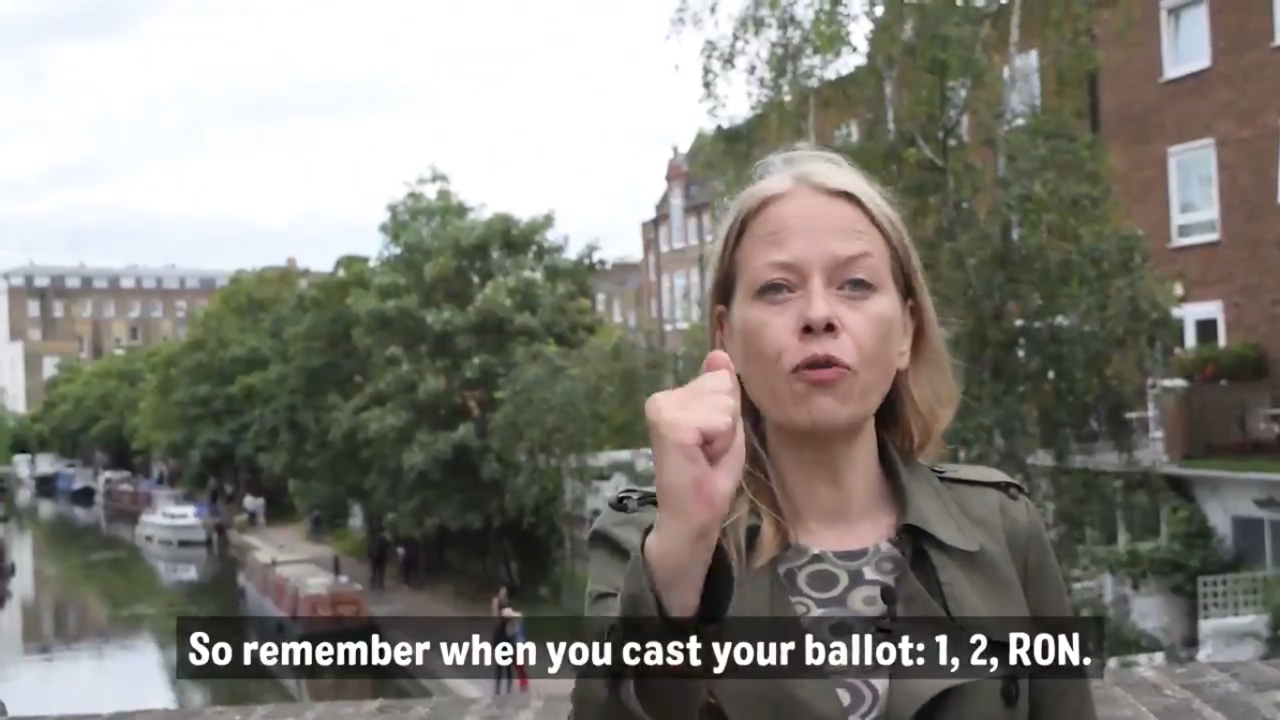 A still from a video of Sian Berry with captions reading: "So, remember when you cast your ballot: 1, 2, RON