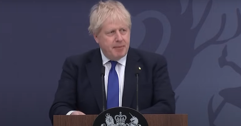 Boris Johnson announcing the government's policy to process migrants in Rwanda