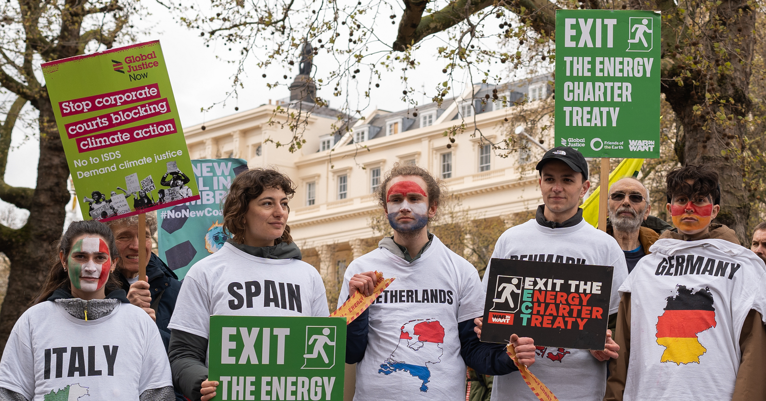 Campaigners protesting against the Energy Charter Treaty