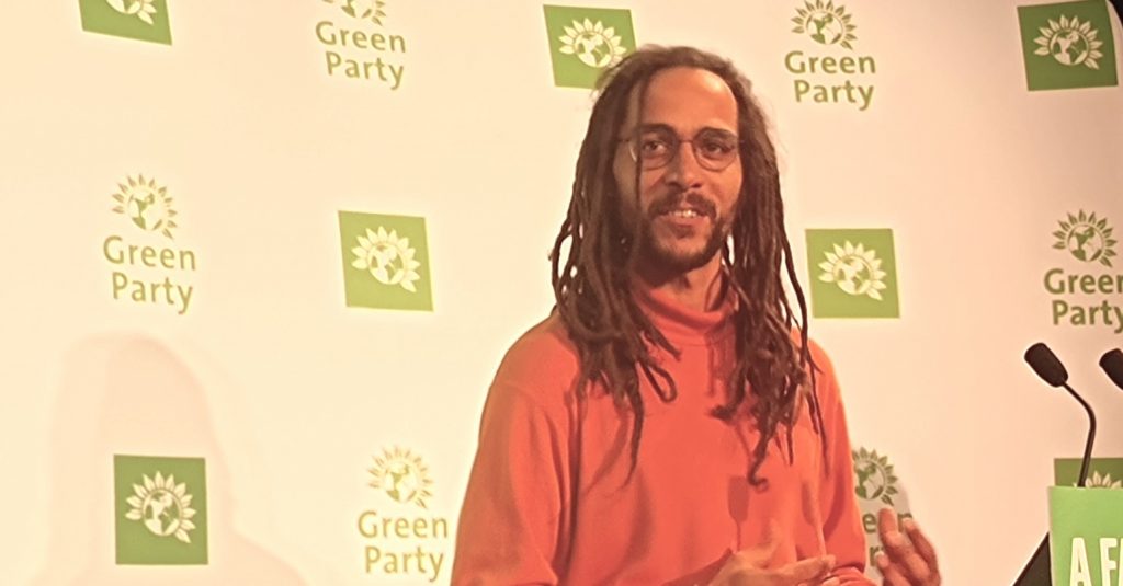 Greens of Colour chair Tyrone Scott speaking at Green Party Conference